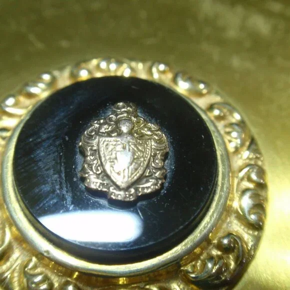 Gold Guild Compact with Sterling and Onyx Emblem.